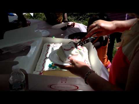 Persephone cutting the cake