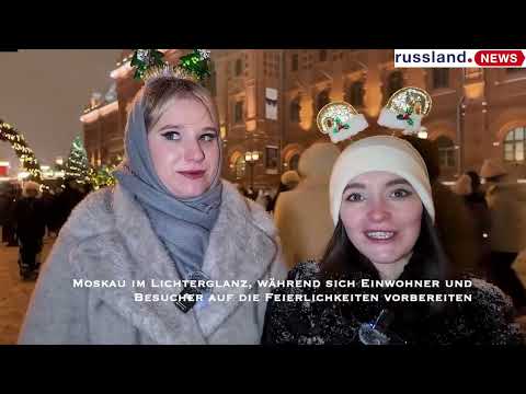 Moskau im Lichterglanz, während sich Einwohner und Besucher auf die Feierlichkeiten vorbereiten