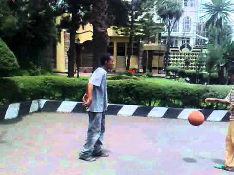 Ethiopian boy doing crazy basketball tricks.mp4