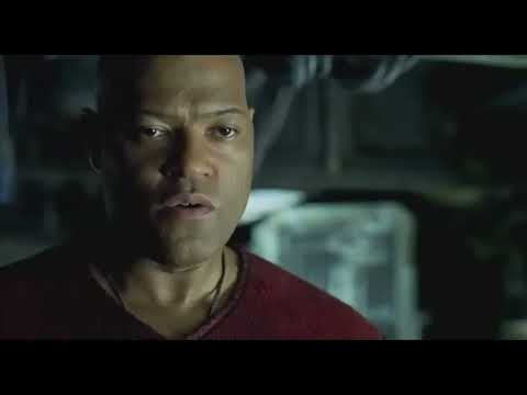The Matrix Reloaded 2003 trailer frame with Neo and Trinity in bullet-time action pose
