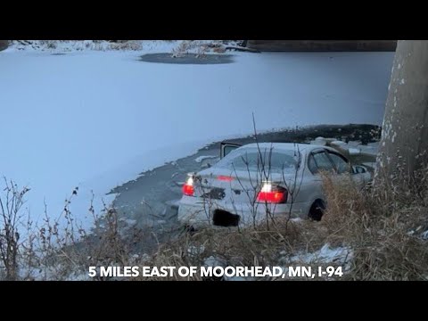 Car Slides Into River Off Interstate-94 East Of Moorhead, Minnesota