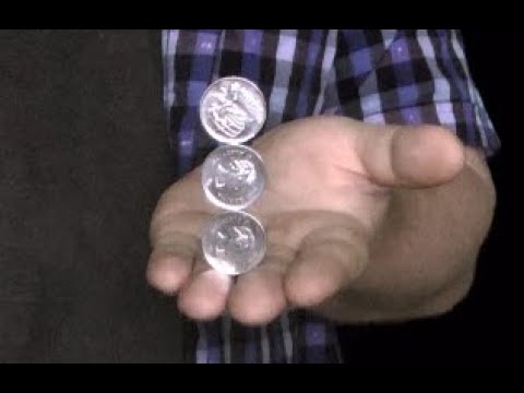 Balancing Quarters Magic Trick