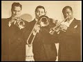 Louis Armstrong  talks about Heebie Jeebies with Eddie Condon. Jack Teagarden Trombone.