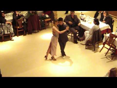  Luciano Paulino  and  Allice Baêta  are  dancing  to  the  tango  "  Por Una Cabeza  "