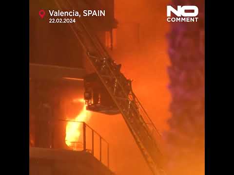 Fire engulfs 2 buildings in Spanish city of Valencia, killing at least 4 people, several missing