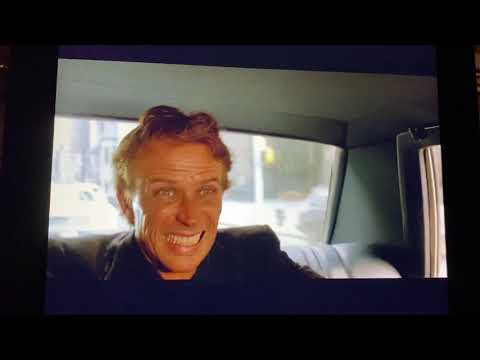 Shakedown  (1988) Police chase taxi to the courthouse