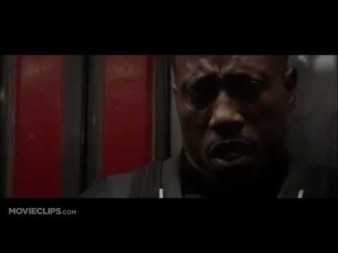 Close-up trailer shot of Blade unsheathing sword, stylized lighting