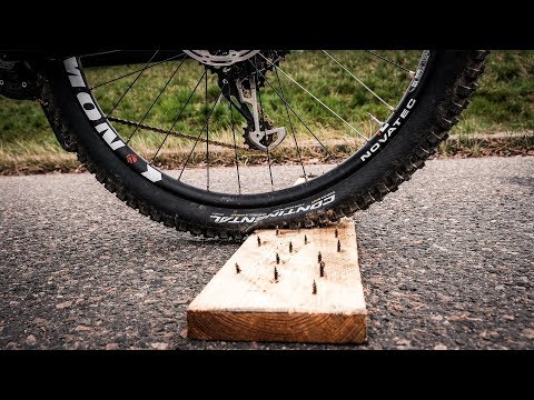 Flat Tire Long Jump Challenge - MTB NAGELBRETT CHALLENGE!