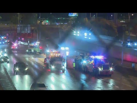 Semi truck rolls over on Kennedy Expressway causing fuel leak at Montrose Avenue; driver injured