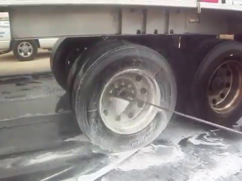 Cleaning Tractor Trailer Aluminum Wheels in Corpus Christi Texas by TruckWashingCorpusChristi.com