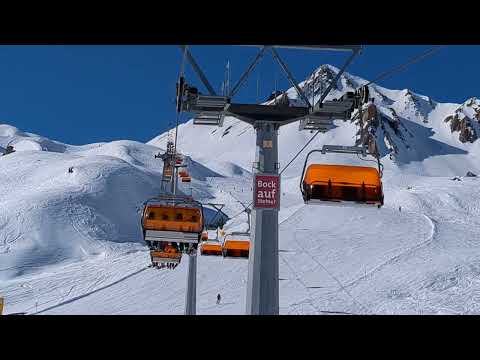 Flimsattelbahn Orange Bubble 4CLD Ski Lift - Garaventa