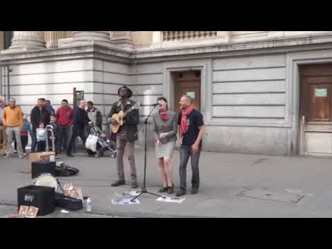 Reggae Busker singing three little birds (Street Performance)