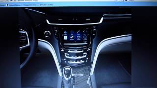 Cadillac XTS vs. Easter Island Head vs. Baboon