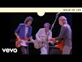 Videoklip Dire Straits - Walk Of Life  s textom piesne