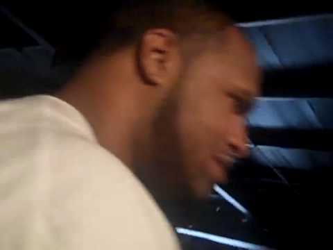 Slim Thug checks out Bun B's shoes