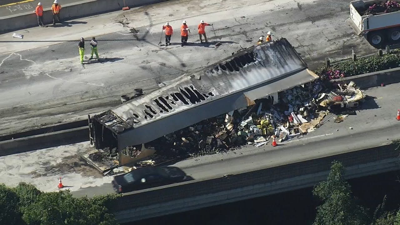 2 separate overturned big rigs cause highway cleanup and traffic mess