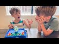 Brother Blows Out Birthday Candles