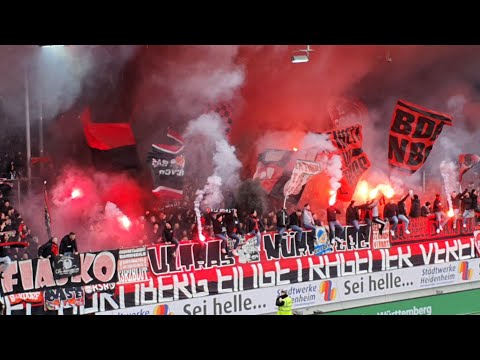 03.04.2022 1. FC Heidenheim - 1. FC Nürnberg 3:1, Pyrotechnik, Support Ultras Nürnberg, Gästeblock