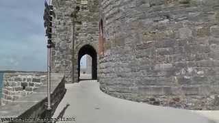 Walking Around Caernarfon Castle medieval fortress In Gwynedd , North-West Wales