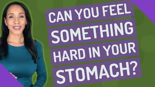Can you feel something hard in your stomach?
