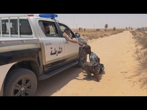 WATCH: Libyan border guards rescue migrants in remote desert area