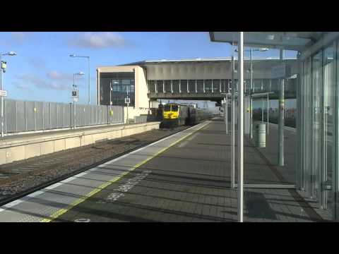 Irish Rail 201 loco 220+ mk4 set 4006 passes Adamstown