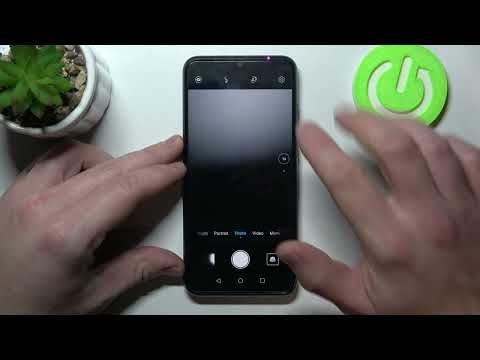 How to change camera storage location on HONOR 20E?