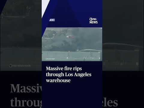 Massive fire rips through Los Angeles warehouse