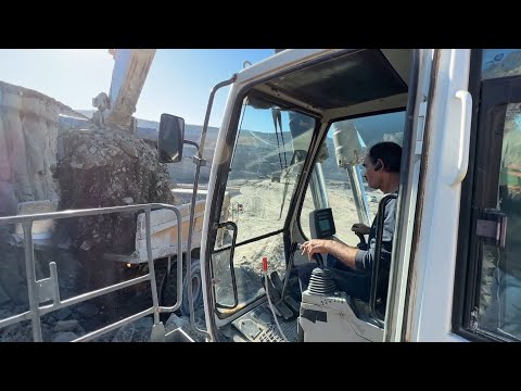 Liebherr 984 Excavator Loading Caterpillar 775E And 773D Dumpers - Labrianidis Mining Works