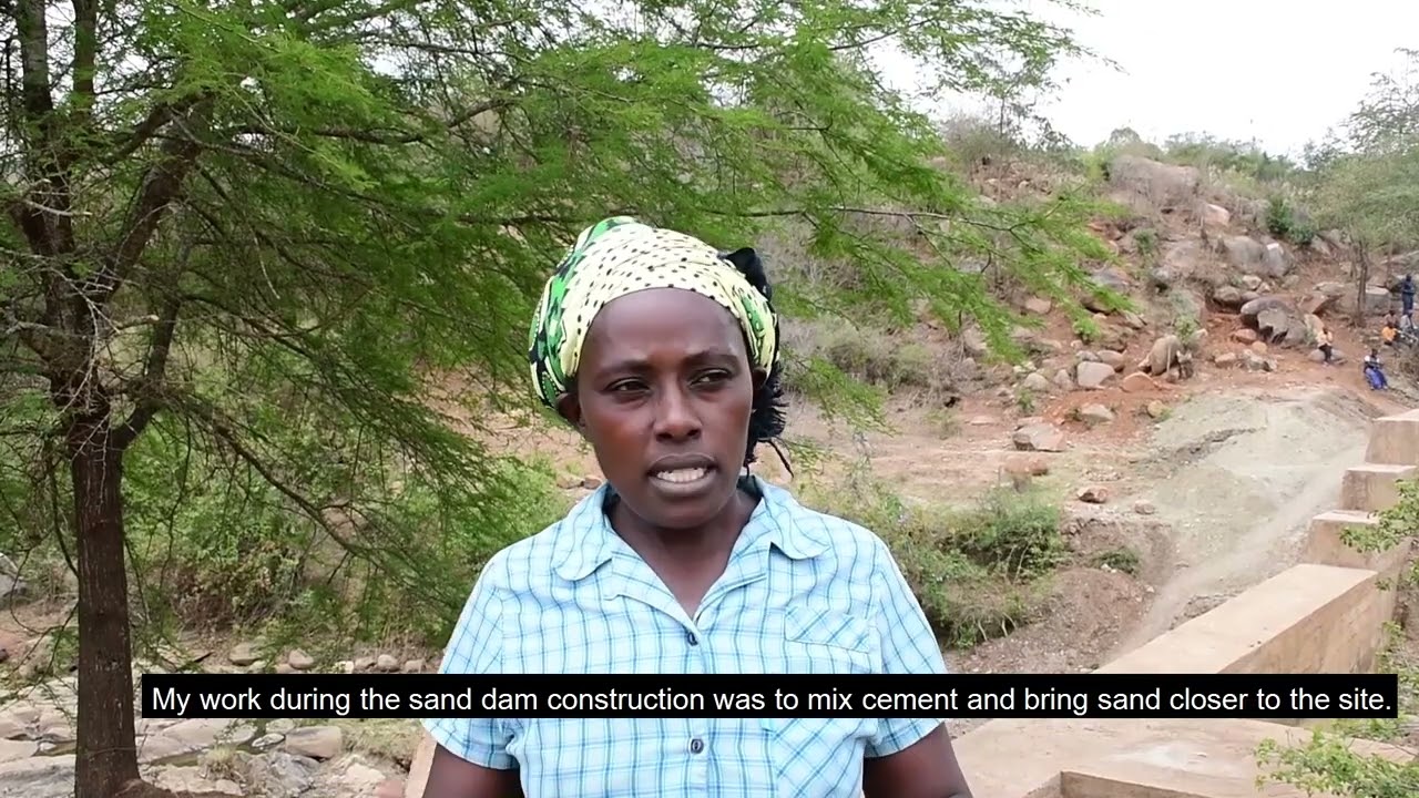 Lucy - helping to build a sand dam with her own hands and give her community access to clean water
