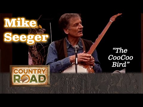 Mike Seeger teaches the group about his gourd