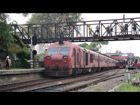 S11 #903 accelerates the express train "Ruhunu Kumari" at Ambalangoda station in Sri Lanka