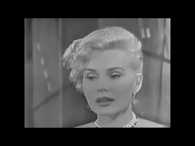 Vídeo relacionado con Una vida es poco : Zsa Zsa Gabor y Wendy Leigh / traducción de Diana Falcón