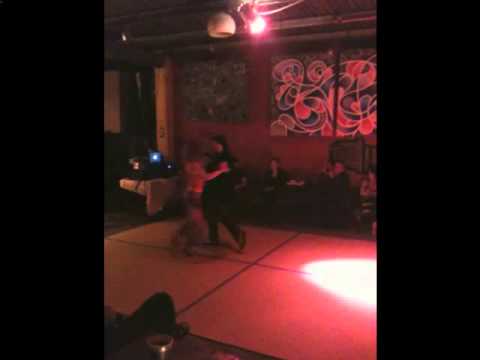  John Galindo  and  Noelia Barsi  are  dancing  to  the  tango  "  Quién sos  "  by  Orquesta Típica Misteriosa Buenos Aires  in  2011