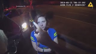 Video shows field sobriety test for woman after friend jumps from car and dies