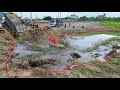 Process Filling Rock Delete Small Pond By Powerful KOMATSU D53P Bulldozer And 25 5ton Dumptrucks