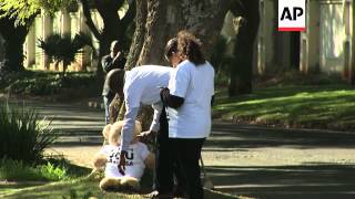 Mandela remains in serious condition; Winnie Mandela visits; Teddy bear tribute