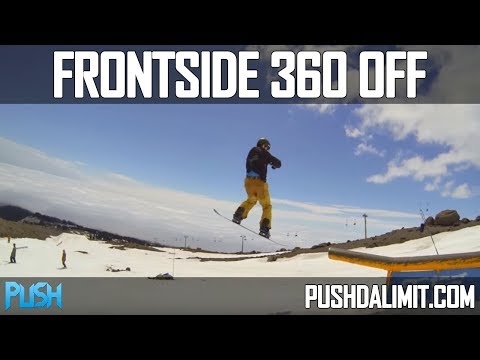 Frontside 360 Off of a Rail on a Snowboard (Slow Motion) - PUSH