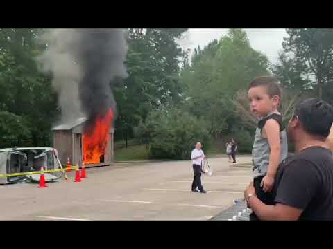 Firefighters putting out a real fire (for kids)