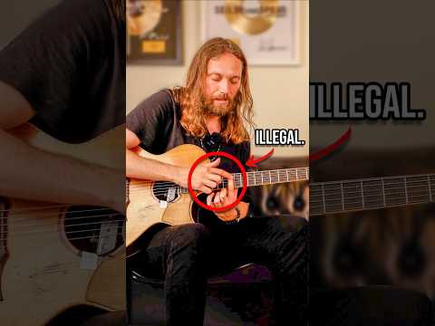 This acoustic guitarist must be STOPPED.