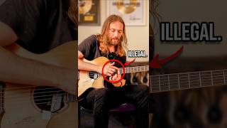 This acoustic guitarist must be STOPPED.