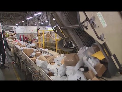Behind the scenes at USPS for holiday season