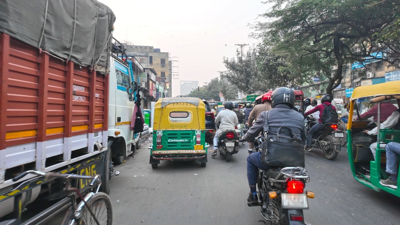 Immersive street-level walking tour through This is NEW DELHI, India, showcasing authentic urban landscapes, local architecture, and the vibrant atmosphere of the city's neighborhoods