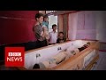 Living with the dead in Indonesia - BBC News