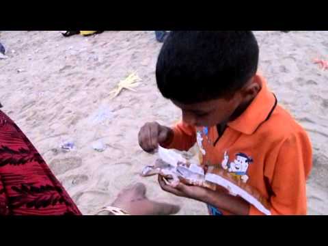 harish eating icecream in beach