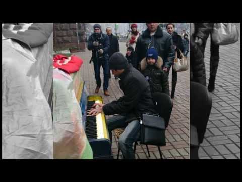Improvising on a piano in the streets of Kiev