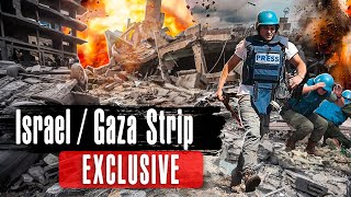 Israel - Gaza Strip / Exclusive video: Reporting from the frontline / How people run for their lives