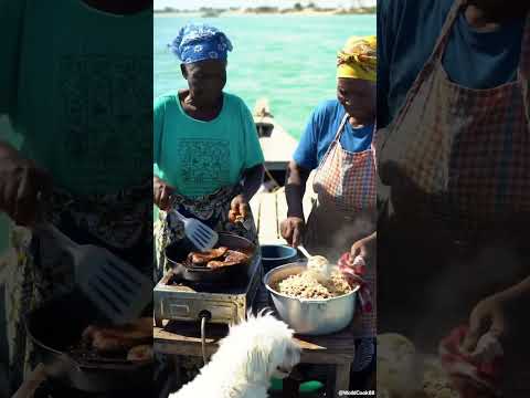 Haitian Grandmas with Dog Cooking Griot and Rice on a Boat” #grandmacooks  #food #africanfood