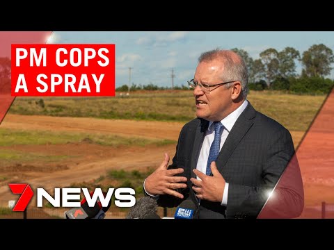 Prime Minister Scott Morrison told to get off man's lawn mid-press conference | 7NEWS