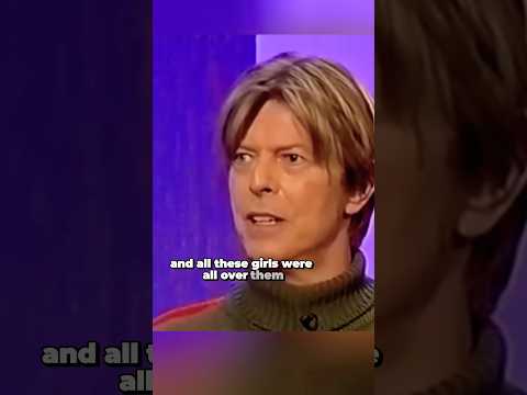 Thumbnail for David Bowie talks about his band wearing make-up and costumes for the shows by David Bowie